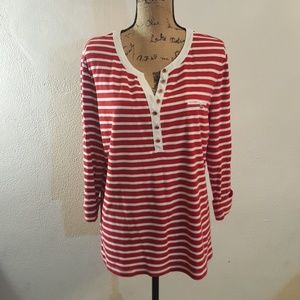 Red and white striped button down shirt.